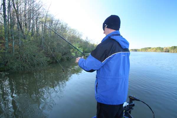 8:47 a.m. Card flips a jig to submerged wood cover in the upper end of Lake X.