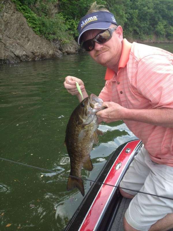 John Stoughtenger with a 4-pound practice bass.