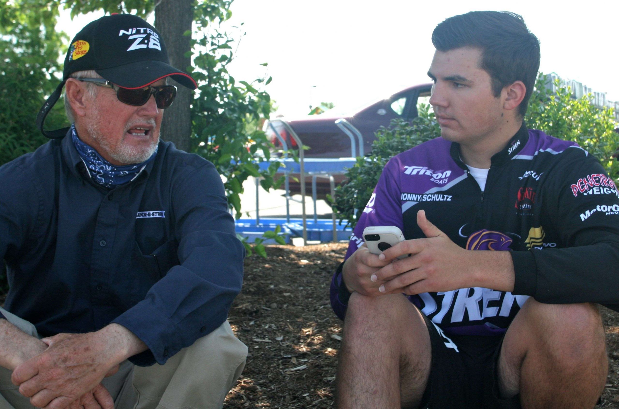 Jonny Schultz (right) was part of the University of Arkansas bass fishing team that helped provide instruction. And Schultz got some fishing tips as well, from one of the all-time greats in the bass fishing world, Rick Clunn. 