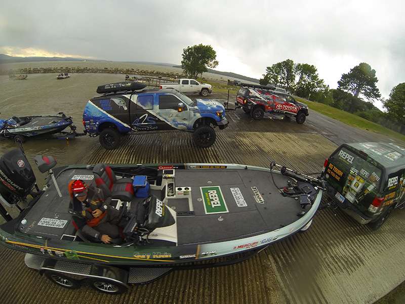 Anglers rushed to their trucks to load their boats before the storm hit.