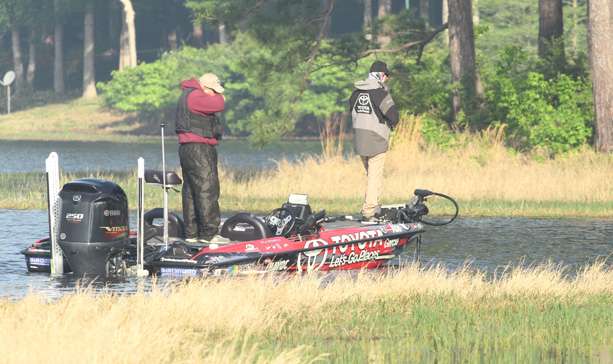 While Michael Iaconelli searches the shallow water.