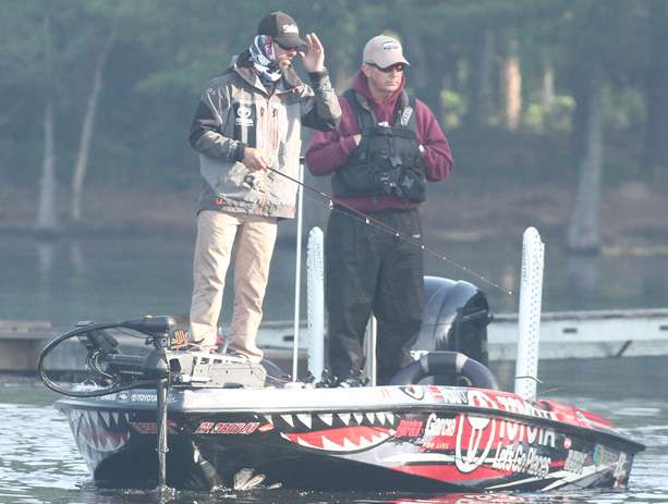 Iaconelli shields his eyes while looking for bedding fish.