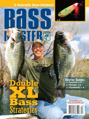 Lunker hunter Mike Long holds up two bass that equal about 30 pounds â a feat not many can match. This December 2009 cover prompt's readers to read about Long's 