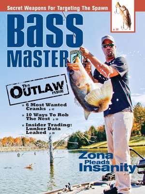 Mark Zona, host of <i>The Bassmasters</i> and <i>Zona's Awesome Fishing Show,</i> swings aboard a nice one on the March 2012 cover. He caught it by deadsticking jerkbaits. (Photo by James Overstreet)