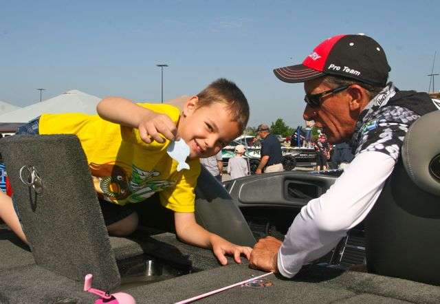 Charley Hartley helped this young angler put a fish in the livewell.