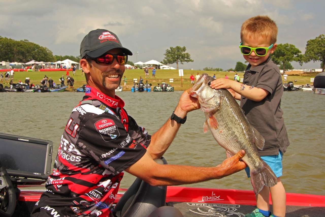Mike Iaconelli shares a 7-pound, 8-ounce bass with his fish-loving young son, Vegas. 