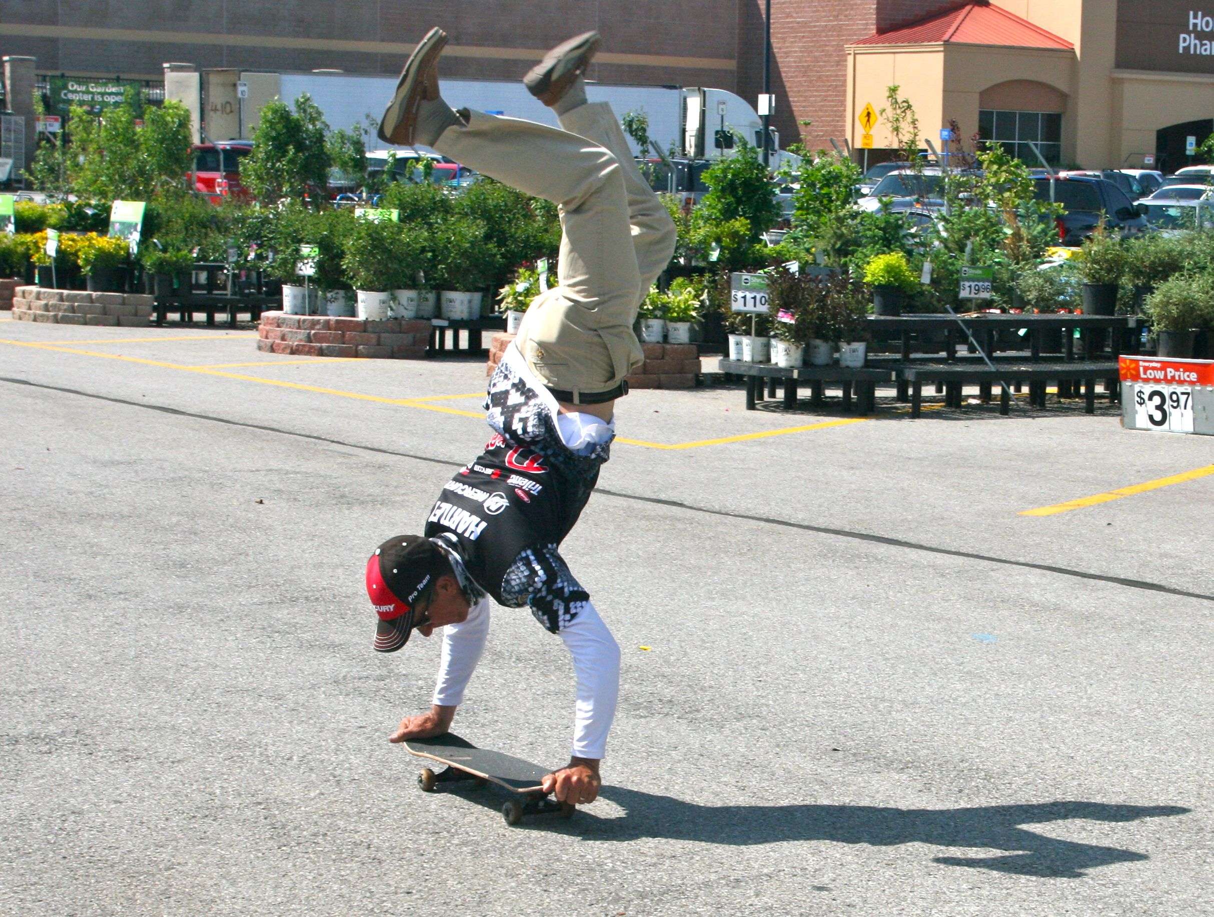 Hartley can still perform a few tricks on a skateboard, as demonstrated by a handstand he held long enough to capture with this photo.