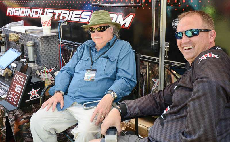 B.A.S.S. poet laureate Don Barone and Rigid Industries' Chris Brown talk in the shade. 