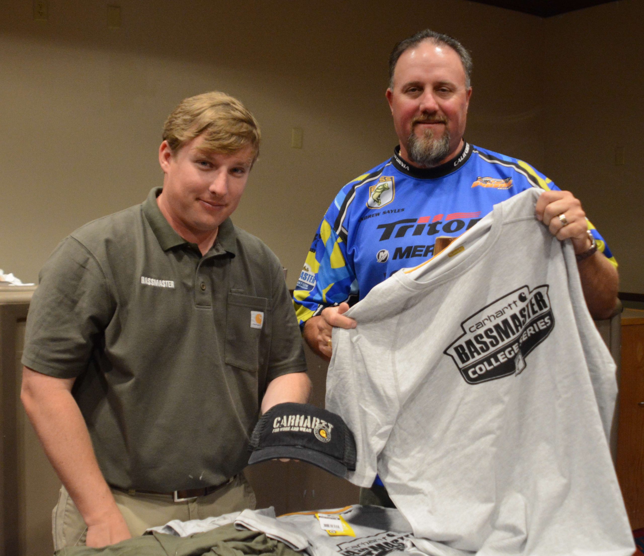 Hank Weldon of B.A.S.S. and Andrew Sayles of the California B.A.S.S. Nation are in charge of giving out sponsor products.