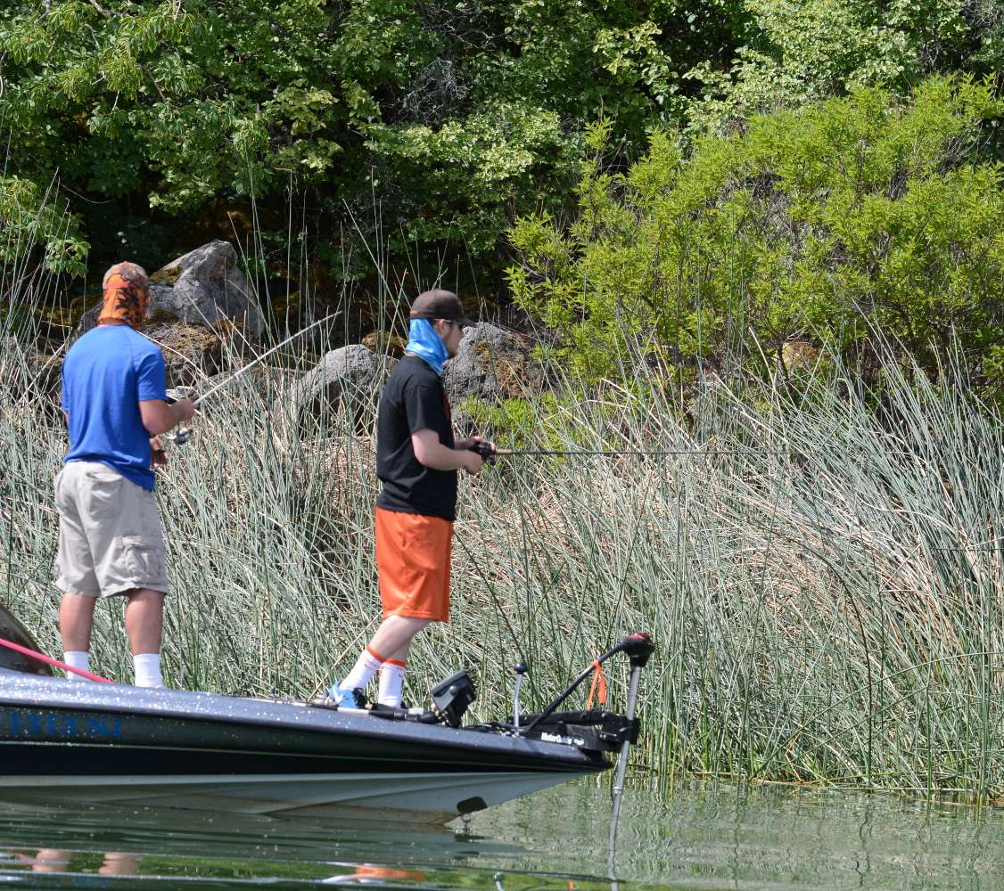 Around the bend, Chase Cochran and Ryan Sparks of Oregon State University are fishing grass.