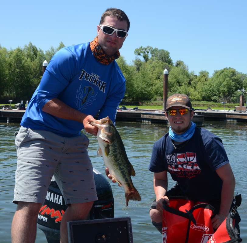 Chase Cochran and Ryan Sparks of Oregon State University show off one of their prize fish from Day 2, a 6-pounder.