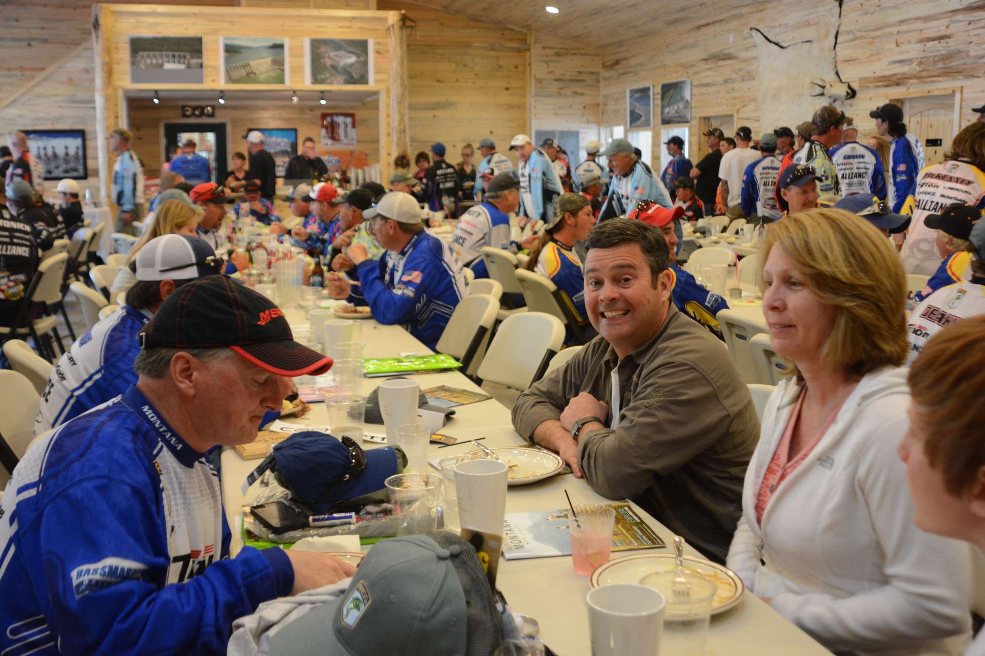 With the business behind them, anglers enjoy a barbecue dinner.