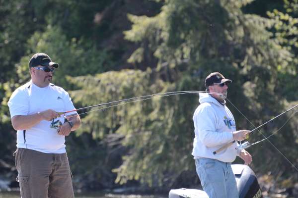 In spitting distance is the tournament leader, Chris Felty, and his boat partner, Gary Collins.