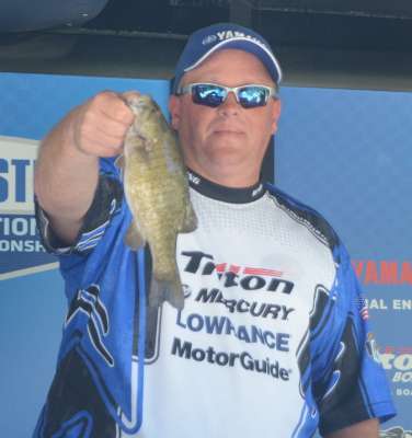 Dave Cole of Wyoming âearnsâ small bass honors today at Noxon. His 13-ouncer tied with another small bass today and also tied with the Day 1 small bass.