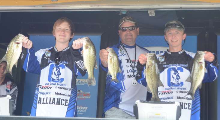 Montana high school anglers Dylan Josey and Tyler Evans with coach Shane Baertsch