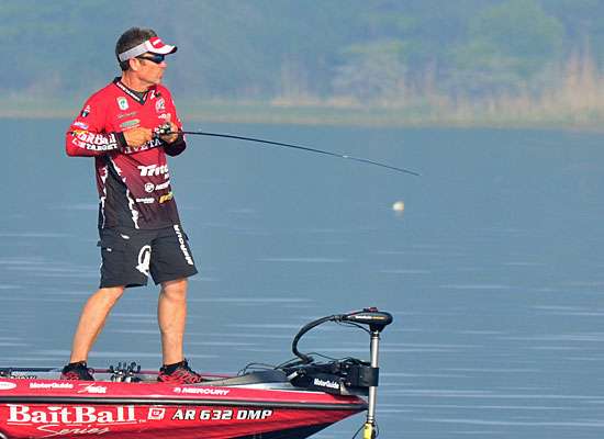 Nearby, Arkansas pro Stephen Browning puts the screws to a bass.