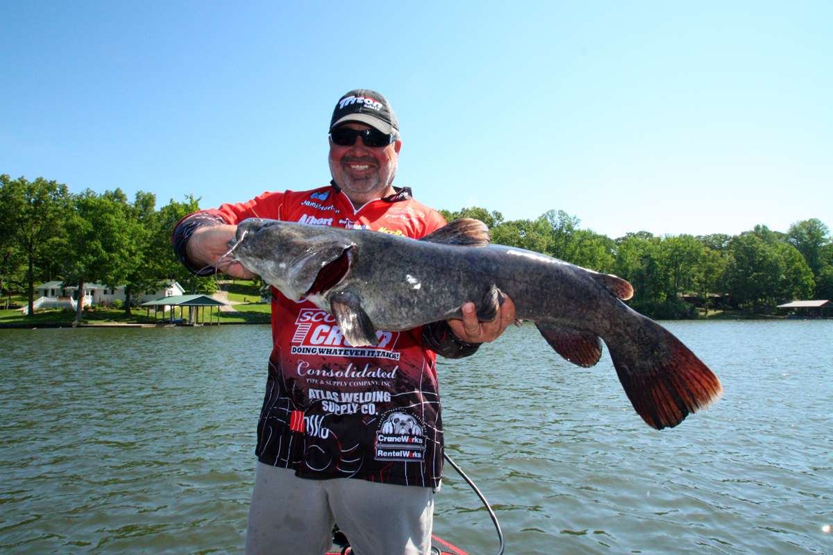 10:48 a.m. Horton tries a flipping jig around shoreline wood cover on Lake B and came up with this guy. 