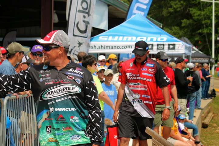 And the weigh-in startsâ¦that 1st angler there in this photo, Chris Lane, has already won a Bassmaster Classicâ¦that 2nd angler behind him, Jared Lintner, will one day win a Classic as well.