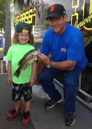 This Little Angler weighs in a bass.
