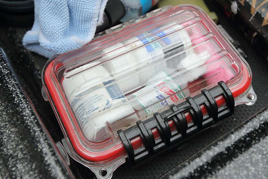 One of the waterproof cases houses a first aid kit.