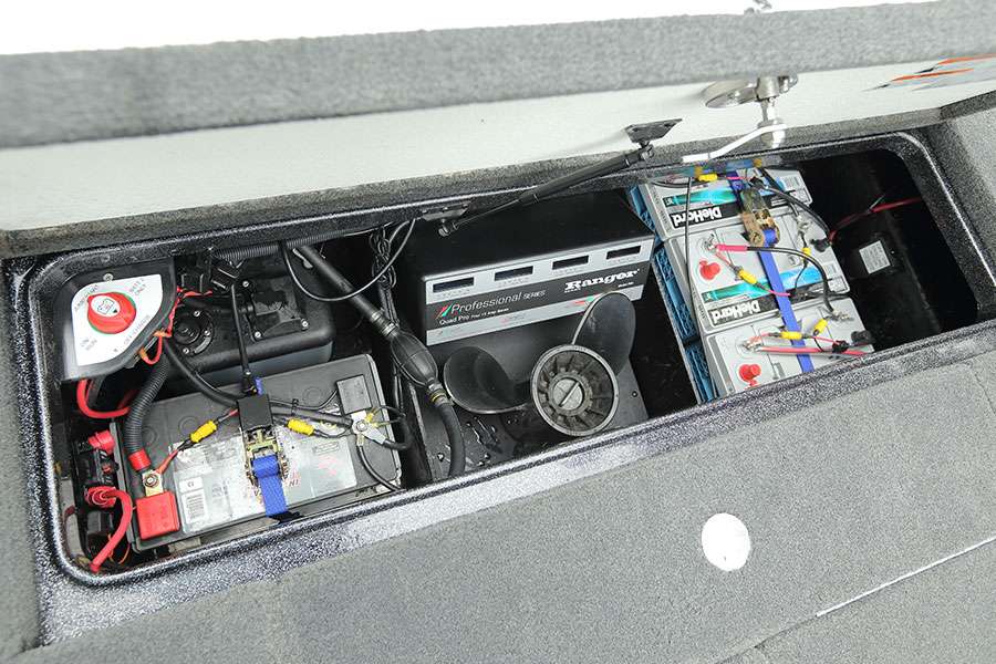 In the very back of the boat is the battery box. Here, four batteries live with the pumps for the Power-Poles, oil for the outboard, other pumps and the on-board charger reside.