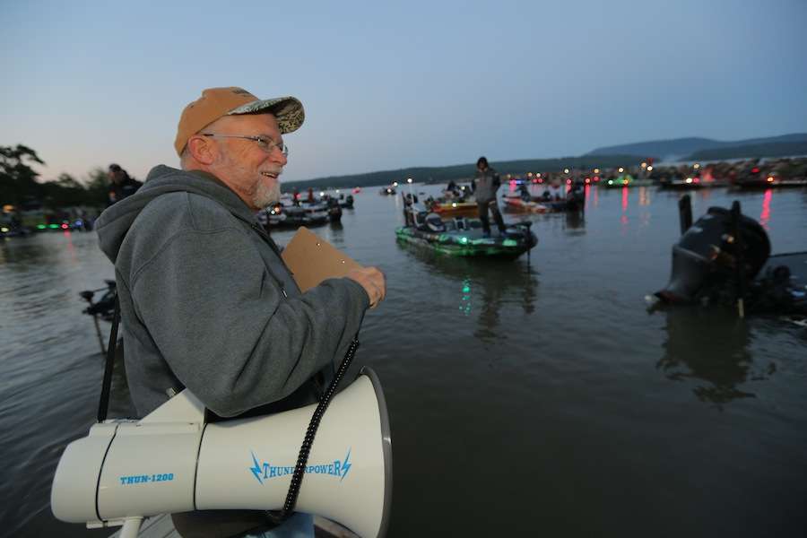 B.A.S.S. official Chuck Harbin herds cattle on Day 1 as he works to get the Elite anglers in line for take-off. 