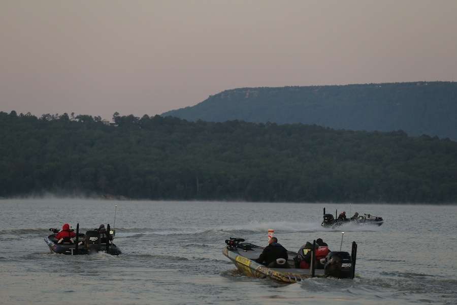 Anglers round the point and head out onto Lake Dardanelle. 