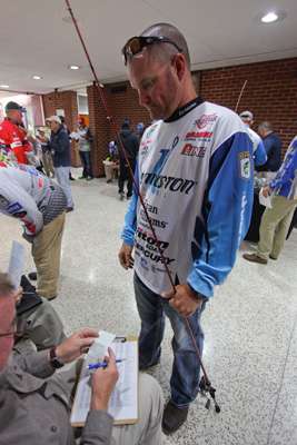 Hank Cherry presents his Arkansas fishing license. 