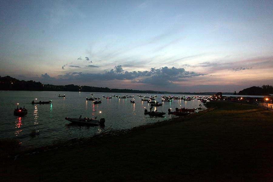 Boats light up the predawn sky on Douglas Lake at The Point Marina in Dandridge, Tenn., on Day 1 of the Bass Pro Shops Northern Open #1 presented by Allstate.