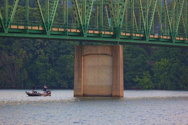 Troy Morrow fishes close to the bridge crossing Douglas Lake near downtown Dandridge, Tenn., on Day 1 of the Bass Pro Shops Northern Open #1 presented by Allstate.