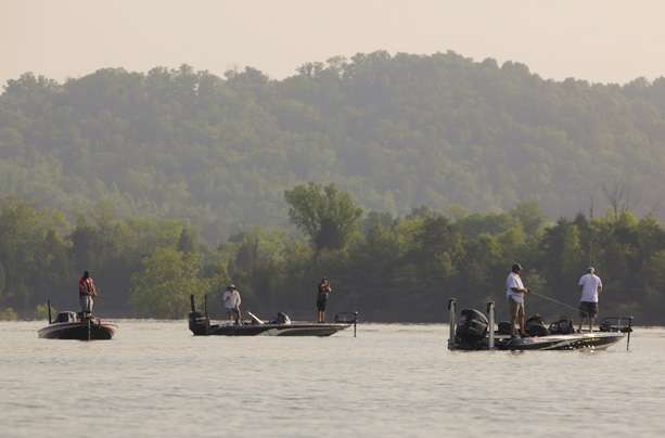 Another crowd of anglers share water on Day 1. 