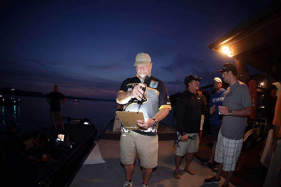 B.A.S.S. Max Leatherwood takes a look at the boat lineup prior to the 6 a.m. takeoff. 