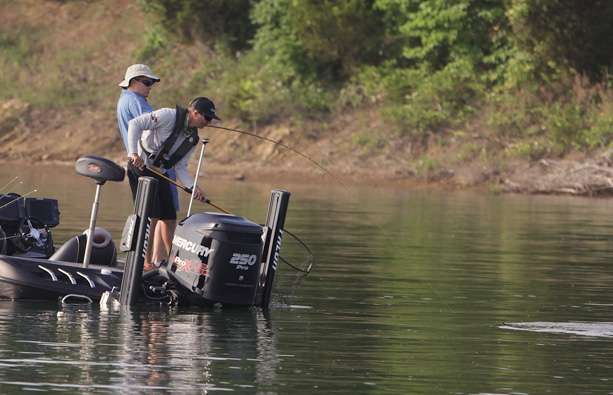 Ehrlerâs co-angler Greg Mauldin hooks up with a fishâ¦Ehrler is ready with the net. 
