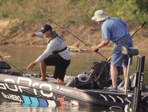 Ehrler works to free the aforementioned crankbait from his tackle. 