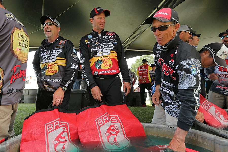 The anglers discuss the day before weigh-in.
