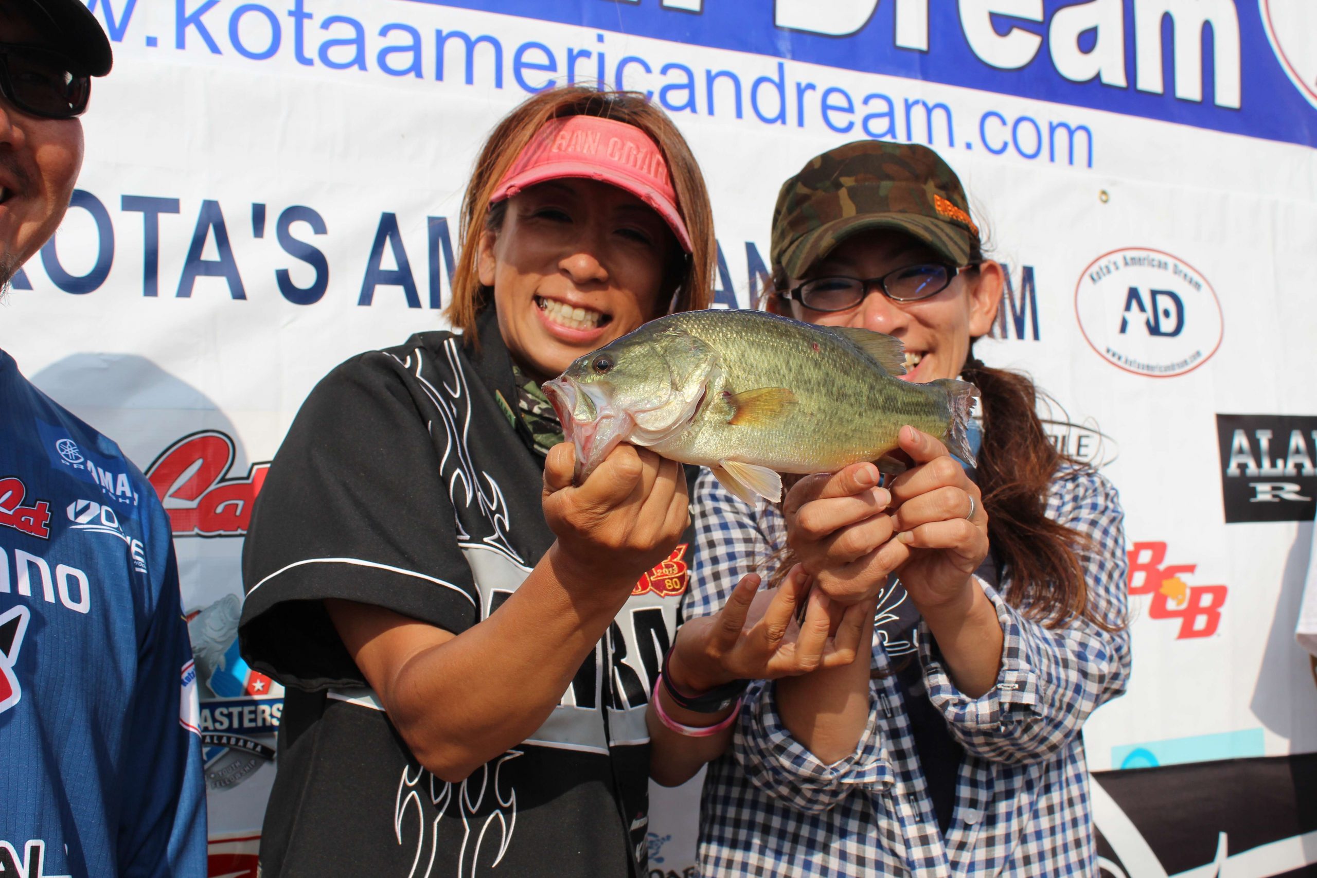 A female team weighs in a nice one from Lake Kitaura.