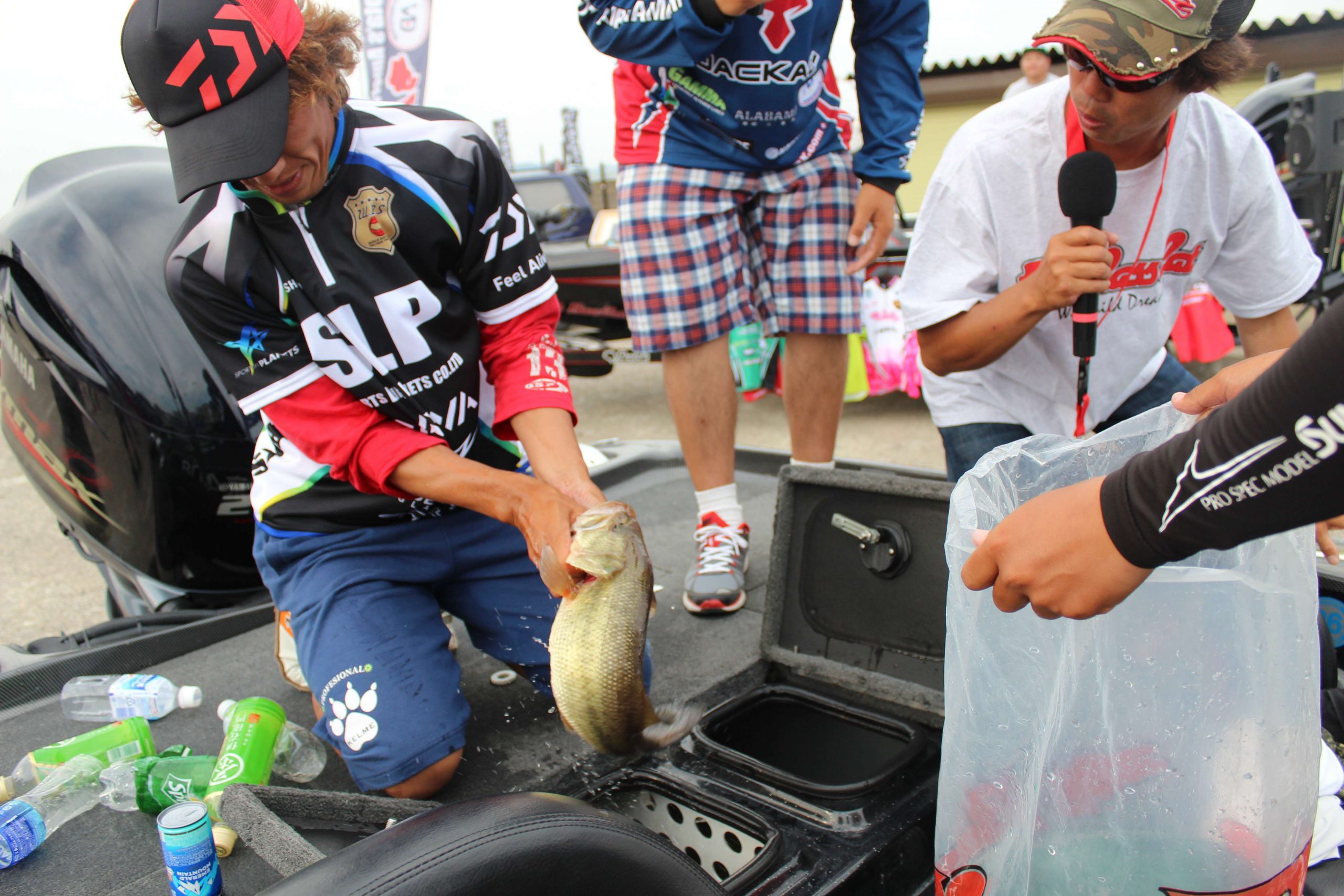 The winning team was the last team to weigh in, and here they are bagging their fish for the drive-through weigh-in.