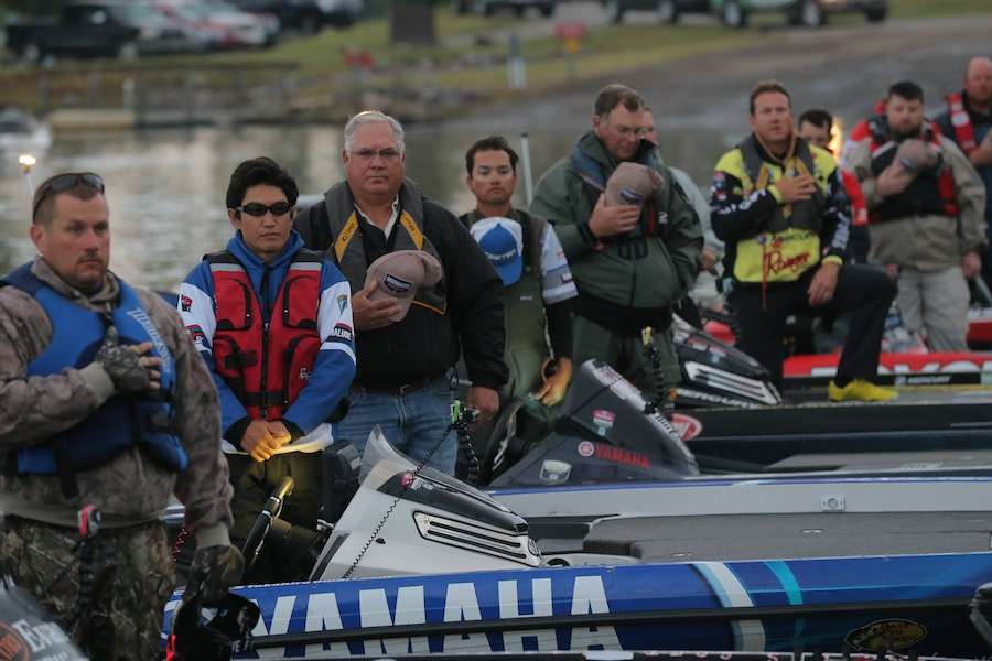 Anglers and marshals pay their respect. 