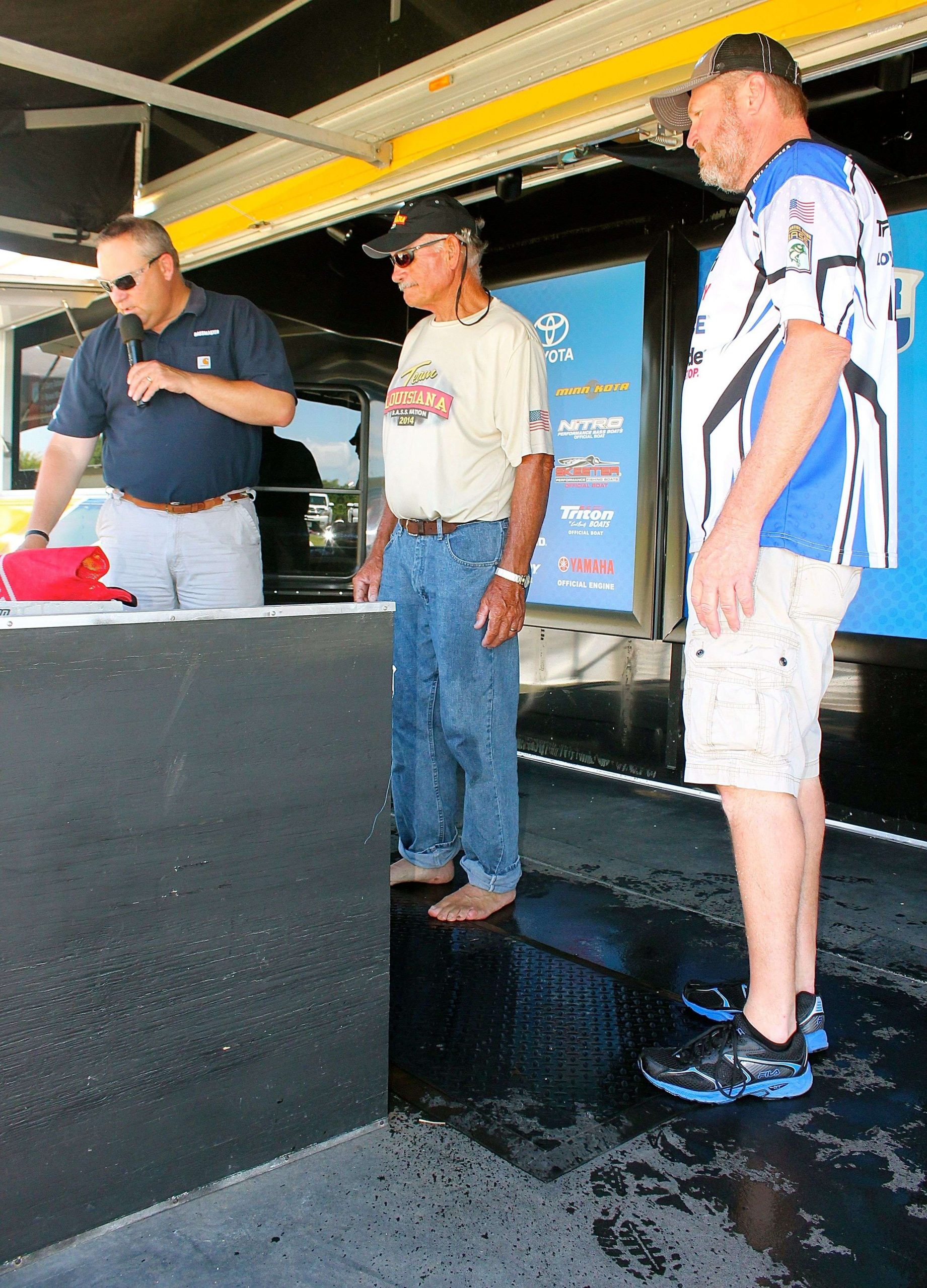 Louisiana angler Will Major sunned his toes as weighed in on Day 1.