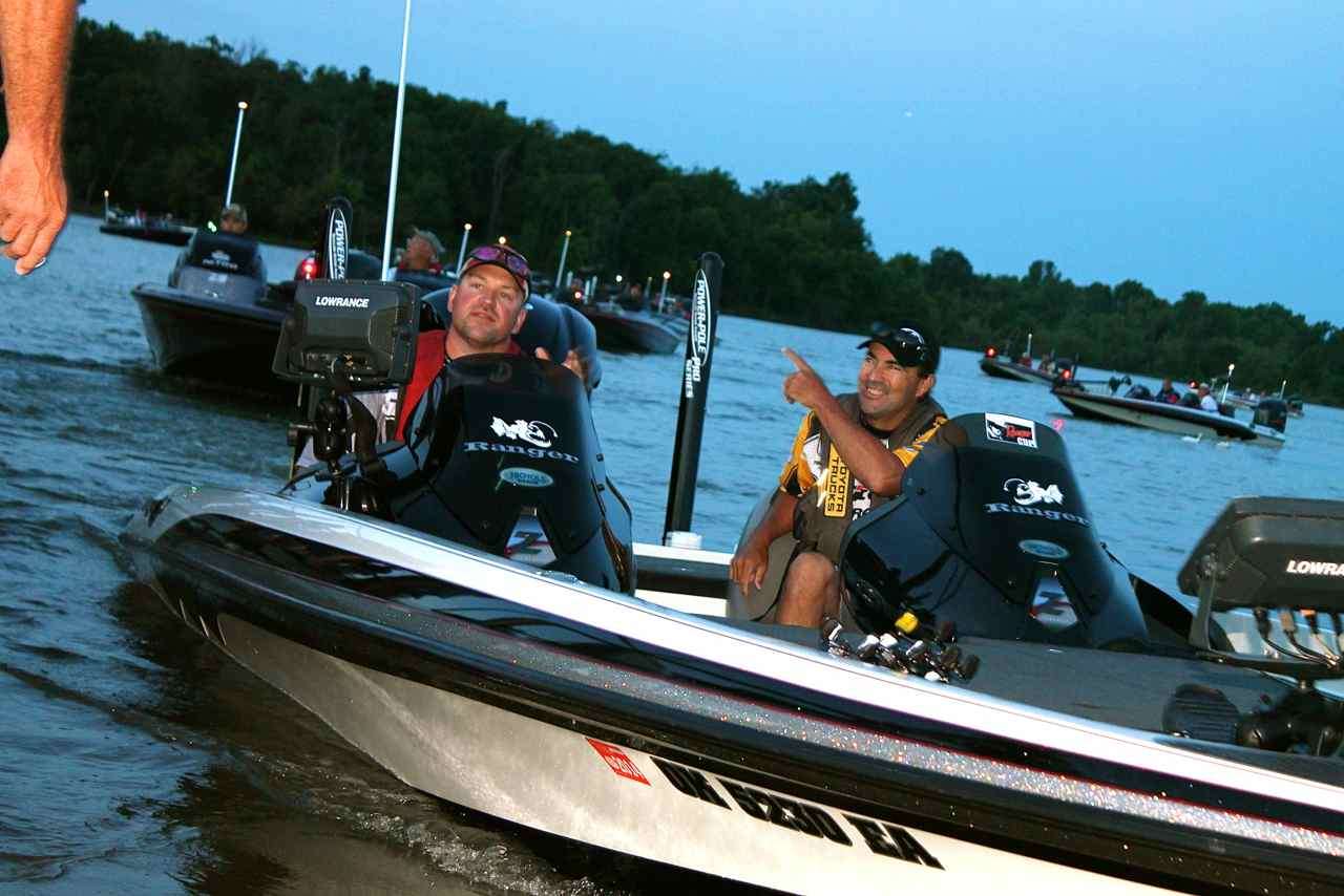 Mississippi B.A.S.S. Nation President Teb Jones (right) acknowledges a well-wisher as he and his Day 1 partner, Kansas angler Brian Penning, prepare for takeoff.