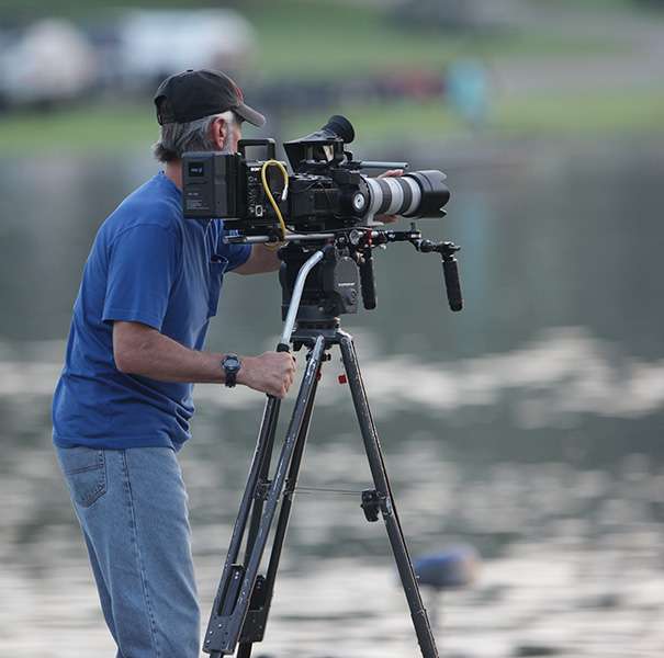 Cameraman Wes Miller takes some shots early this morning.