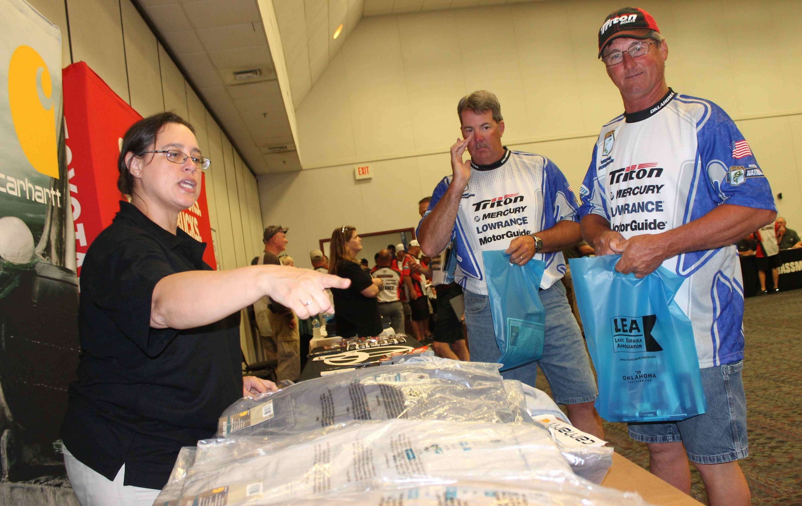 Oklahoma anglers Robert Degreffenreid (left) and Mike Anthamatten step up to pick out some Carhartt gear.

