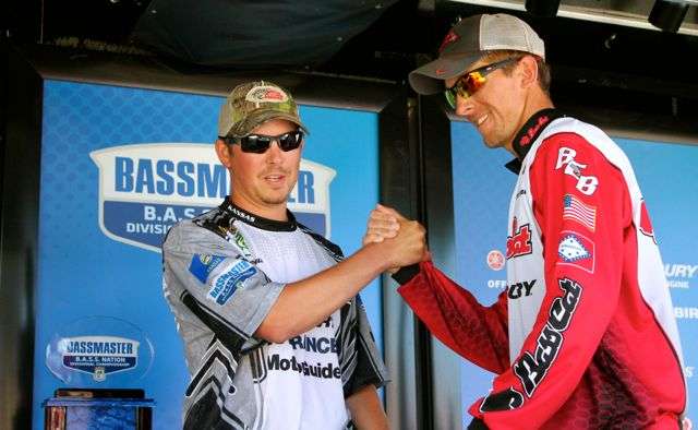 Kansas B.A.S.S. Nation angler Preston Frazell (left) congratulates Arkansas angler Josh Wray upon learning that Wray caught more weight than him, to win the Central Divisional. As the top angler for Kansas, Frazell qualified for nationals with his runner-up finish on Eufaula.