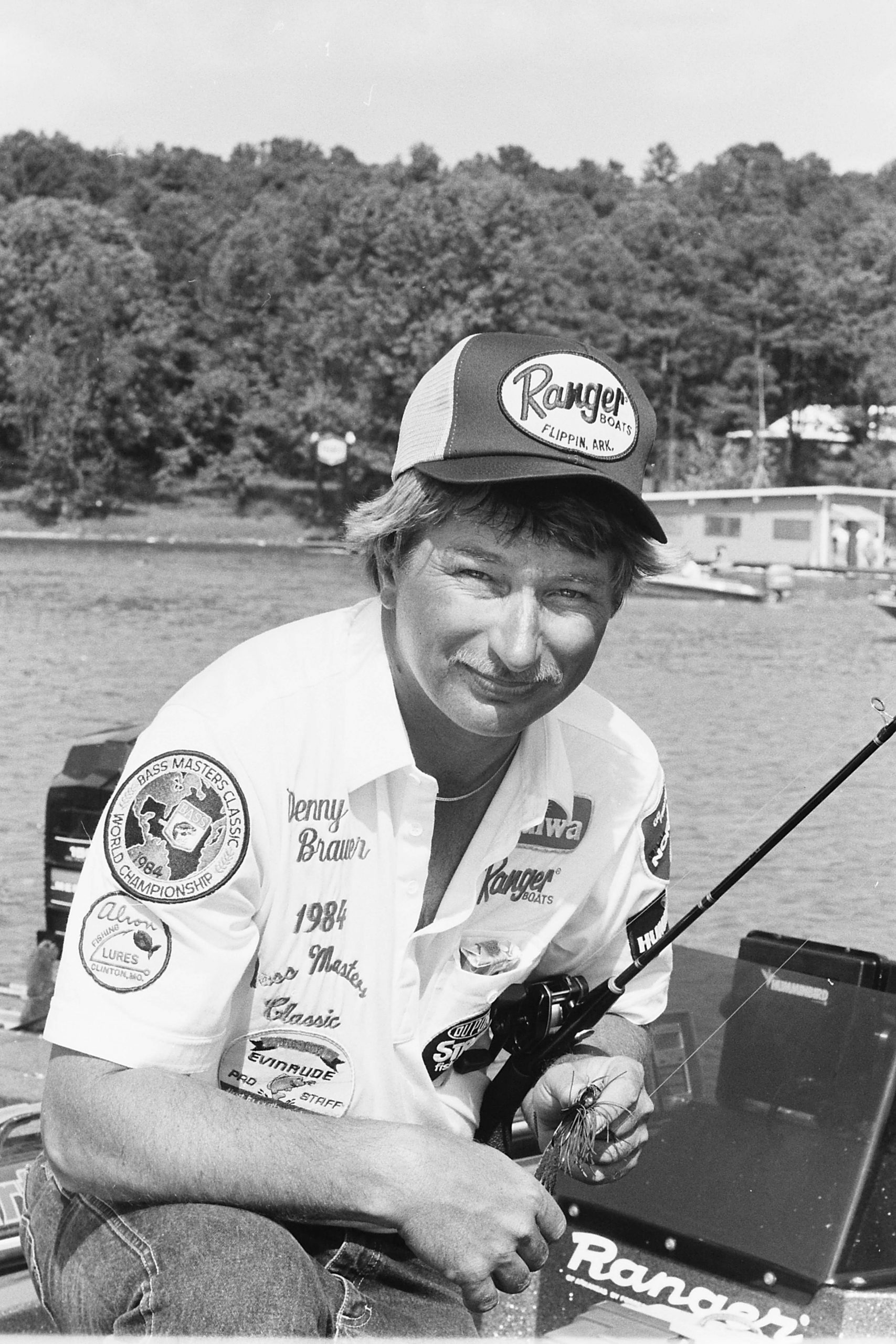 The first tournament B.A.S.S. held there, the Bassmaster Chattanooga Invitational, was May 1-3, 1985. Now-retired Bassmaster Elite Series pro Denny Brauer won the three-day event with 15 bass weighing 35 pounds, 2 ounces. He caught his fish the first two days in the milfoil of Dallas Bay using a 3/8-ounce jig and an Uncle Josh pork trailer. On the final day, he made a long run in heavy chop to a ridge near the Hiwassee River, where he caught more than 16 pounds on a Norman Deep Little N crankbait.