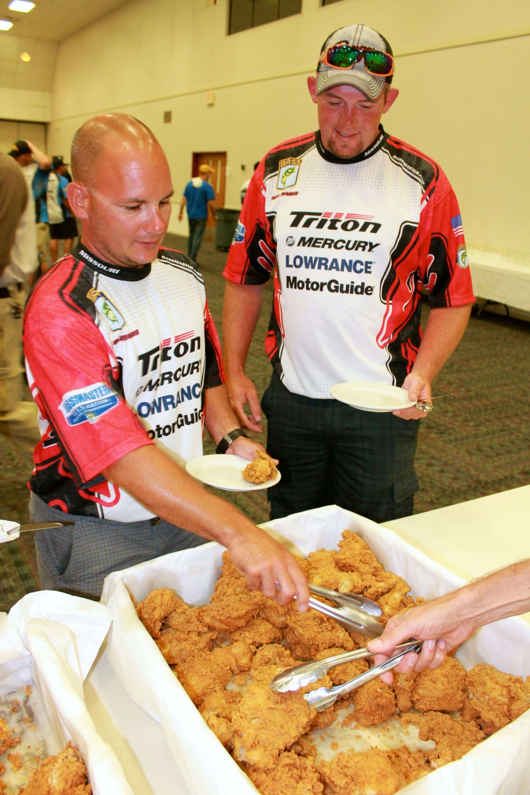 Missouri anglers Charlie Bogard and Nate Maher fuel up with fried chicken.