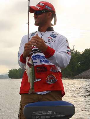 Skylar Hamilton boats a spotted bass and now has a limit.