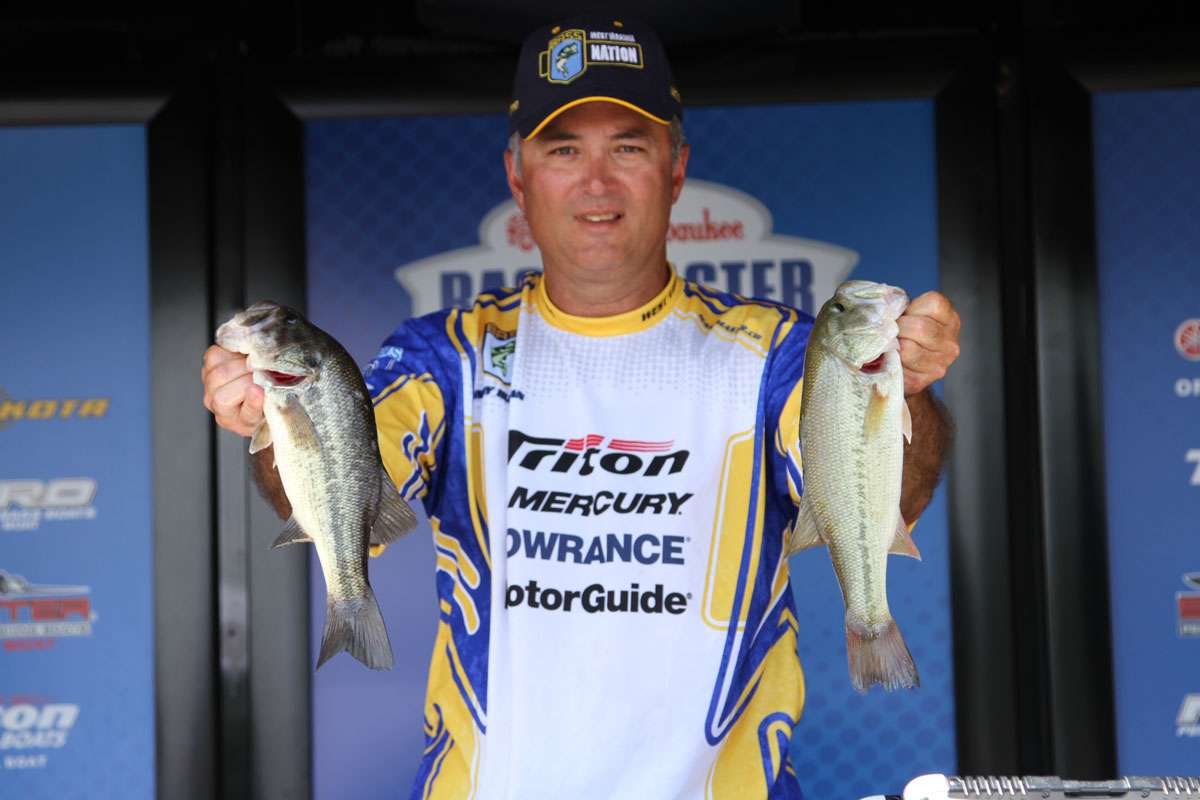 Fourth-place Randy Huffman shows off his Day 2 catch.
