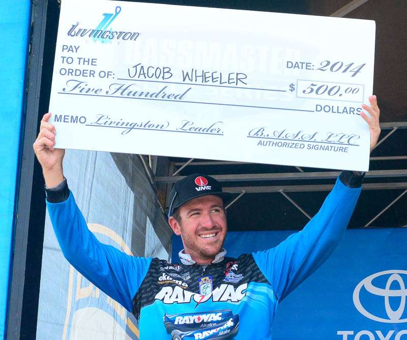Livingston Lures handed Wheeler a big check for being the Livingston Leader - the award goes to the angler who lead the tournament after its second day. 