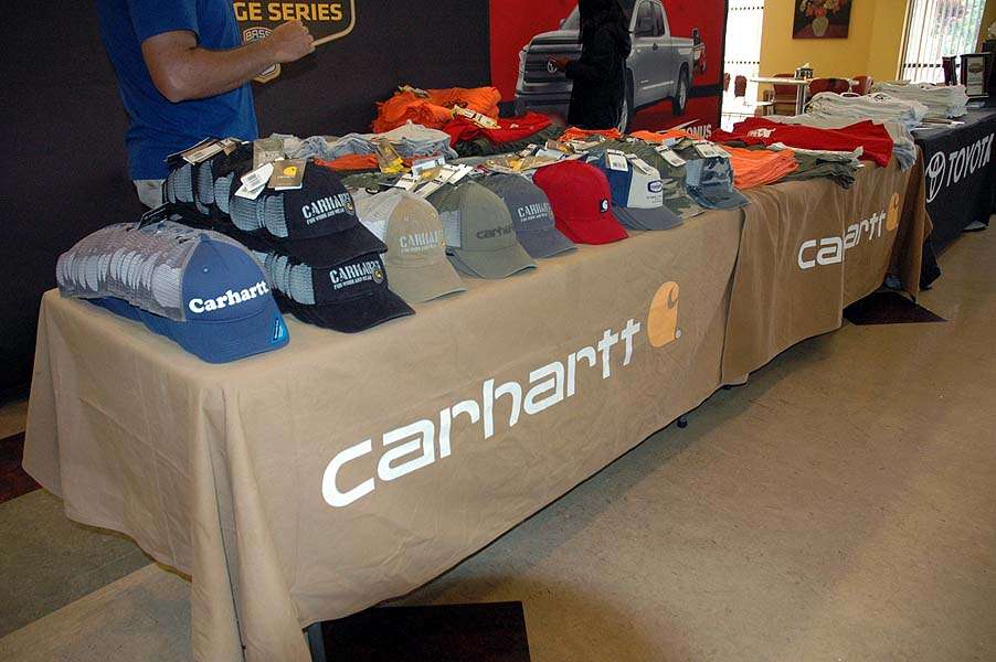 Carhartt hats and shirts are popular items. This table will be clear by the end of registration. 
