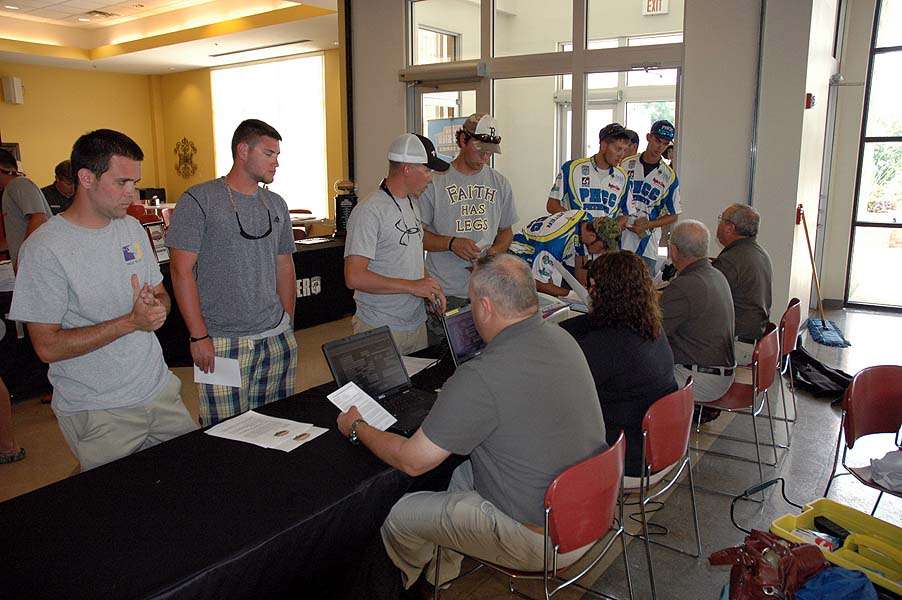 Teams sign in with the B.A.S.S. staff to begin the registration process at Latimer Hall on the campus of Bryan College. 
